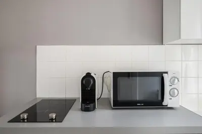 Cuisine ou kitchenette dans l'établissement Appartement Lyon Villeurbanne - Enjoy in Lyon