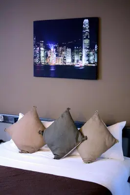 Un ou plusieurs lits dans un hébergement de l'établissement Hotel Gratte-Ciel Ariana