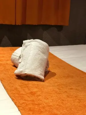 Un ou plusieurs lits dans un hébergement de l'établissement Hotel de Bretagne