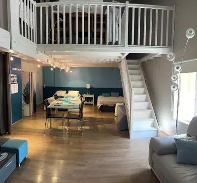 Coin salon dans l'établissement Les Chambres d'Hôtes d'Alice Dior