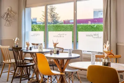 Restaurant ou autre lieu de restauration dans l'établissement Kyriad Lyon Est - Bron Eurexpo Le Cottage
