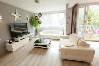 Télévision ou salle de divertissement dans l'établissement Le Célestay