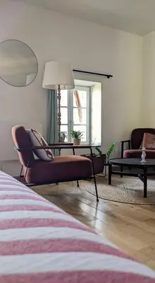Coin salon dans l'établissement Le Clos Du Perret