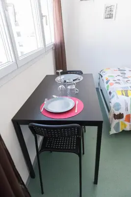 Un ou plusieurs lits dans un hébergement de l'établissement Part-Dieu Lyon Appart