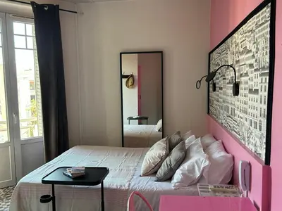 Un ou plusieurs lits dans un hébergement de l'établissement Hôtel de la Croix-Rousse