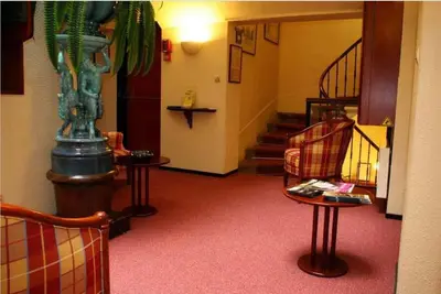 Coin salon dans l'établissement Hotel Elysée