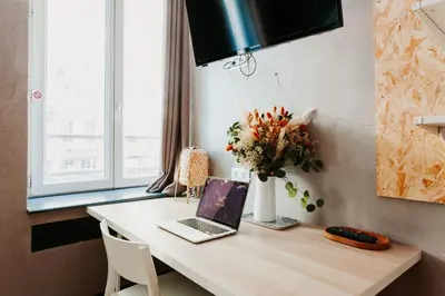 Télévision ou salle de divertissement dans l'établissement Hôtel Taggât