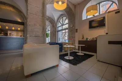 Cuisine ou kitchenette dans l'établissement Appart Hôtel Belambra Lyon Villemanzy
