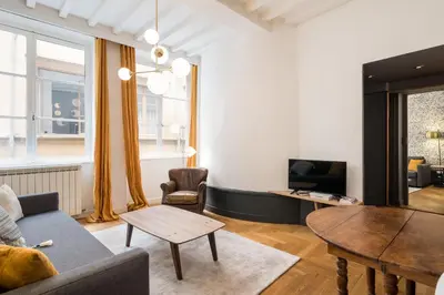 Coin salon dans l'établissement Honorê - Suite Trois Maries