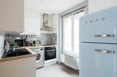Cuisine ou kitchenette dans l'établissement DIFY Cosy - Centre Ville