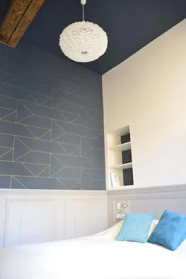 Un ou plusieurs lits dans un hébergement de l'établissement Cosy apartment ideally located in the Old Town