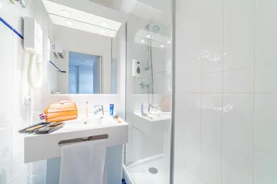 Salle de bains dans l'établissement Résidence Montempô Appart'Hôtel Lyon Part Dieu