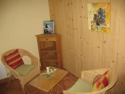 Coin salon dans l'établissement La Ferme Du Chapi