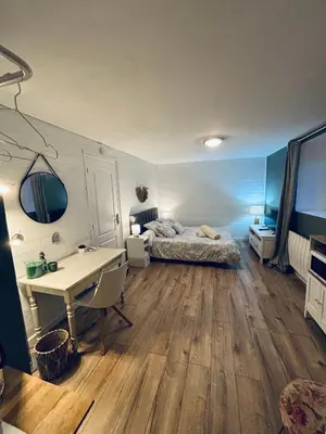 Un ou plusieurs lits dans un hébergement de l'établissement Chambre d'Hôtes du Vieux Collonges