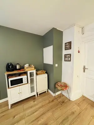 Cuisine ou kitchenette dans l'établissement Chambre d'Hôtes du Vieux Collonges