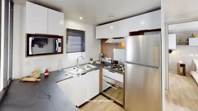 Cuisine ou kitchenette dans l'établissement Camping Officiel Siblu Les Rives de Condrieu