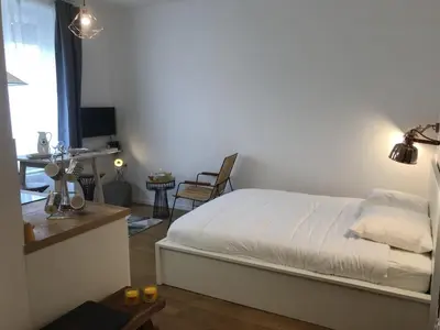 Un ou plusieurs lits dans un hébergement de l'établissement La Suite de Léon appartement D - Lyon Garibaldi