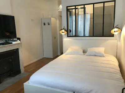 Un ou plusieurs lits dans un hébergement de l'établissement Le Joyau de Jouhaux appartement G - Lyon Garibaldi
