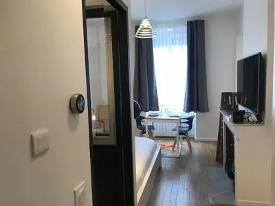 Télévision ou salle de divertissement dans l'établissement Le Joyau de Jouhaux appartement G - Lyon Garibaldi