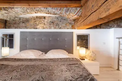 Un ou plusieurs lits dans un hébergement de l'établissement Le Carré Mercière , Appartements de Luxe au cœur de Lyon, Loft