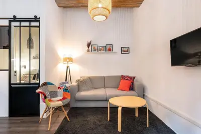 Coin salon dans l'établissement Le 14 Sathonay