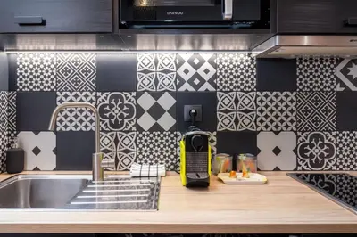 Cuisine ou kitchenette dans l'établissement Le 14 Sathonay