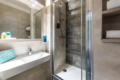 Salle de bains dans l'établissement Hotel Le Lumière