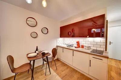 Cuisine ou kitchenette dans l'établissement Apparts Seasons - Saint Étienne Centre - Gare Chateaucreux