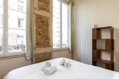 Un ou plusieurs lits dans un hébergement de l'établissement DIFY Lumière - Masséna