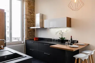 Cuisine ou kitchenette dans l'établissement DIFY Lumière - Masséna