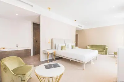 Un ou plusieurs lits dans un hébergement de l'établissement Boscolo Lyon Hotel & Spa