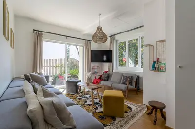 Coin salon dans l'établissement MAISON STELLA