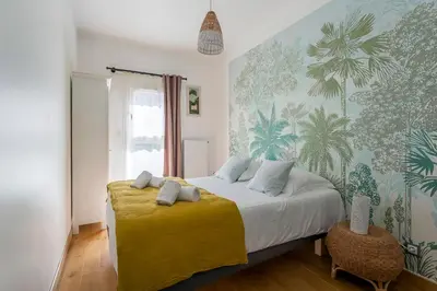 Un ou plusieurs lits dans un hébergement de l'établissement MAISON STELLA