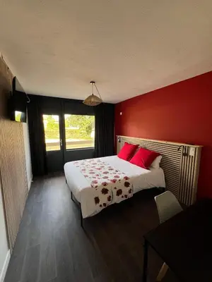 Un ou plusieurs lits dans un hébergement de l'établissement HOTEL RESTAURANT CIRIUS
