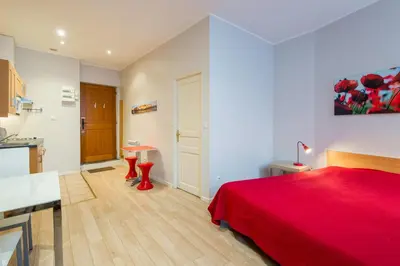 Un ou plusieurs lits dans un hébergement de l'établissement Les Studios De La Place (Part-Dieu)