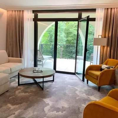 Coin salon dans l'établissement Hotel & Spa Le Pavillon