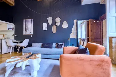 Coin salon dans l'établissement Honorê - Suite Mercière