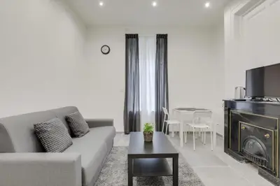 Coin salon dans l'établissement GuestReady - 1-BR, 5 minutes from train station