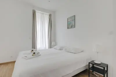 Un ou plusieurs lits dans un hébergement de l'établissement GuestReady - 1-BR, 5 minutes from train station