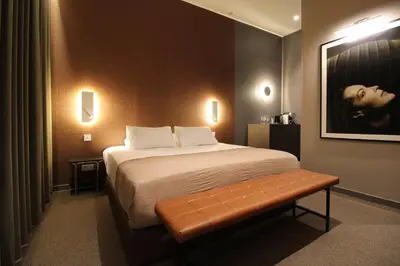 Un ou plusieurs lits dans un hébergement de l'établissement MiHotel Sala