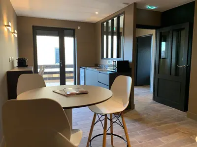 Cuisine ou kitchenette dans l'établissement La Maison du Faisan Doré