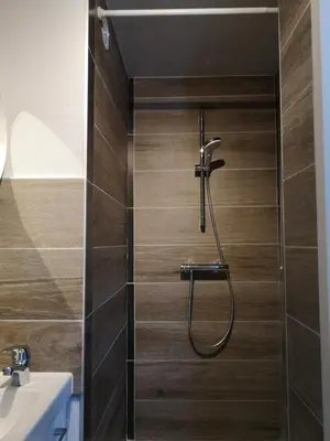 Salle de bains dans l'établissement Immeuble La DOA proche CHU