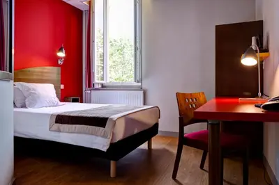 Un ou plusieurs lits dans un hébergement de l'établissement Domaine Lyon Saint Joseph