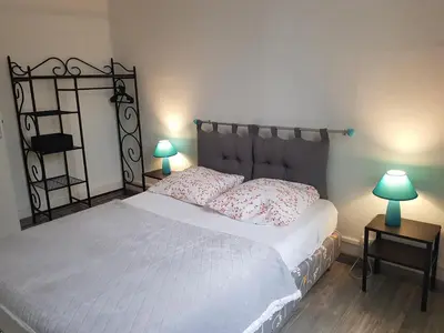 Un ou plusieurs lits dans un hébergement de l'établissement Appart hotel sathonay rillieux Lyon