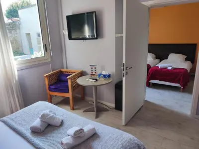 Un ou plusieurs lits dans un hébergement de l'établissement MOODz HOTEL VIENNE