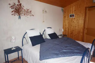 Un ou plusieurs lits dans un hébergement de l'établissement Auberge du Thiollet