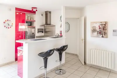 Cuisine ou kitchenette dans l'établissement Appart'cosy Lyon Est