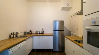 Cuisine ou kitchenette dans l'établissement NOCNOC - Le Rayonnant