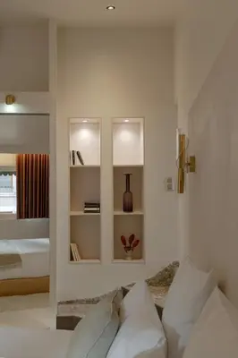 Un ou plusieurs lits dans un hébergement de l'établissement MiHotel Le Gourguillon