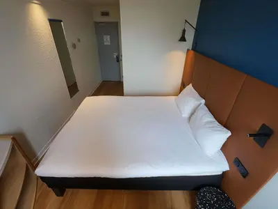 Un ou plusieurs lits dans un hébergement de l'établissement ibis Lyon Est Bron